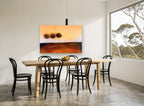 Three Trees at Dusk floral canvas print on the wall of a dining room