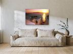 Rowboat Rooftop Sunset coastal canvas print on the wall of a living room
