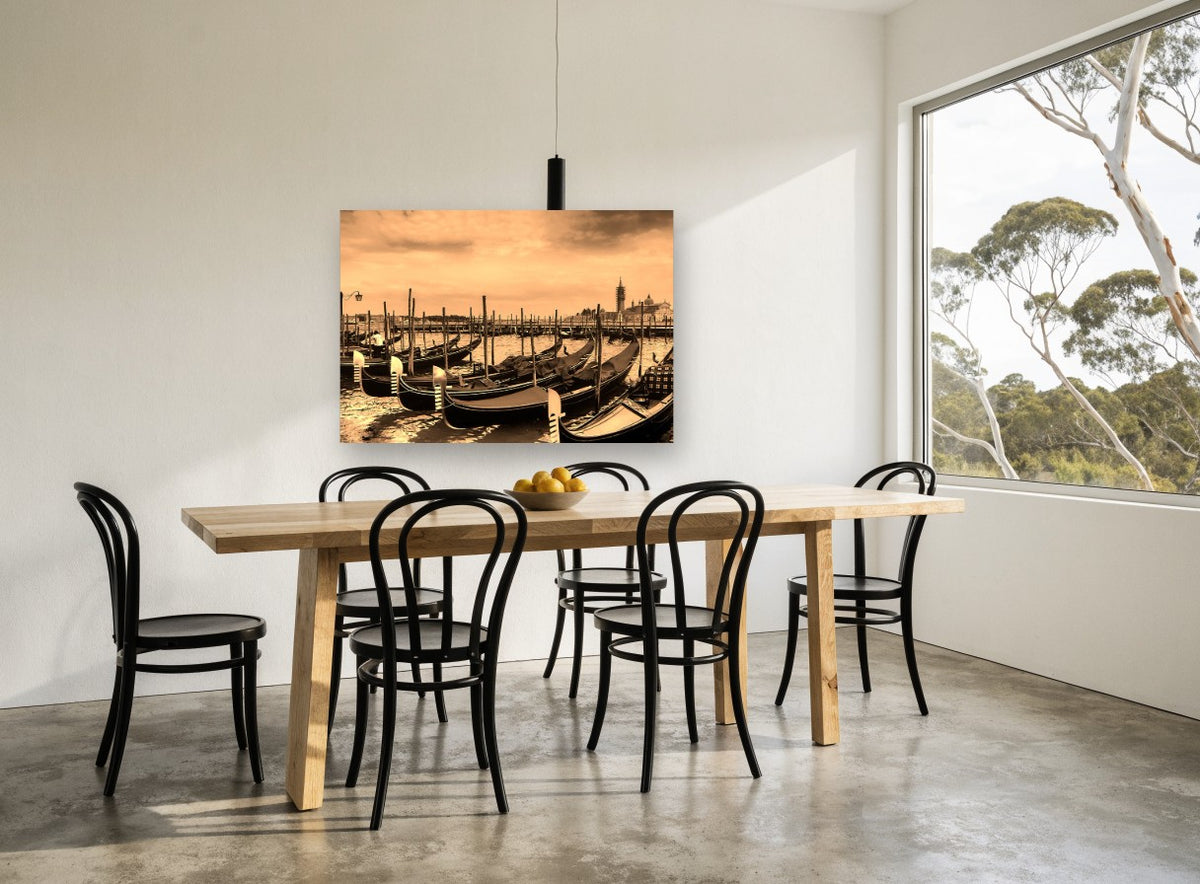 Sepia Gondolas at Rest coastal canvas print on the wall of a dining room