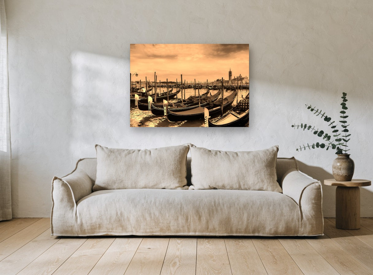 Sepia Gondolas at Rest coastal canvas print on the wall of a living room