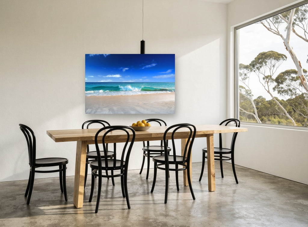 Glassy Shore Break coastal canvas print on the wall of a dining room