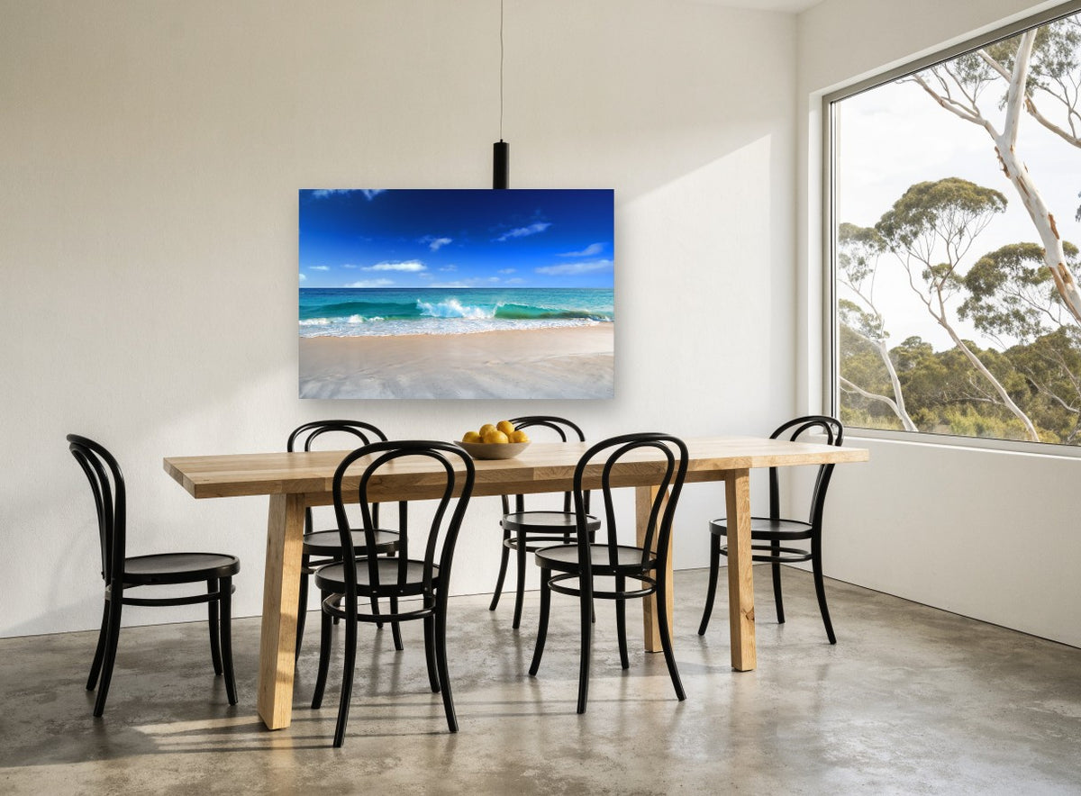 Glassy Shore Break coastal canvas print on the wall of a dining room