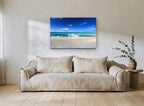Glassy Shore Break coastal canvas print on the wall of a living room