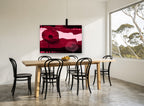 Crimson Poppy Collage floral canvas print on the wall of a dining room