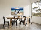 Beachside Dinner Service coastal canvas print on the wall of a dining room