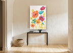Rainbow Poppy Meadow floral canvas print on the wall of a hallway