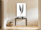 Twin Ears Negative floral canvas print on the wall of a hallway