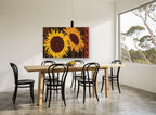 Twin Sunflowers Seed Border floral canvas print on the wall of a dining room