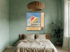 Pink Conch Collage coastal canvas print on the wall of a bedroom