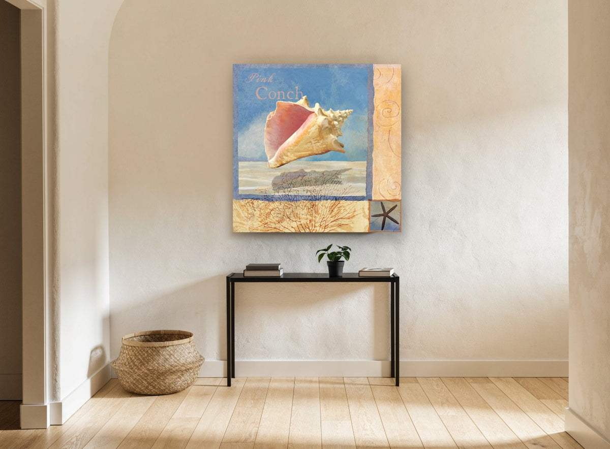 Pink Conch Collage coastal canvas print on the wall of a hallway