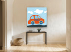 Little Orange Car kids canvas print on the wall of a hallway