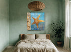 Golden Starfish Seashore coastal canvas print on the wall of a bedroom