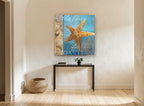 Golden Starfish Seashore coastal canvas print on the wall of a hallway