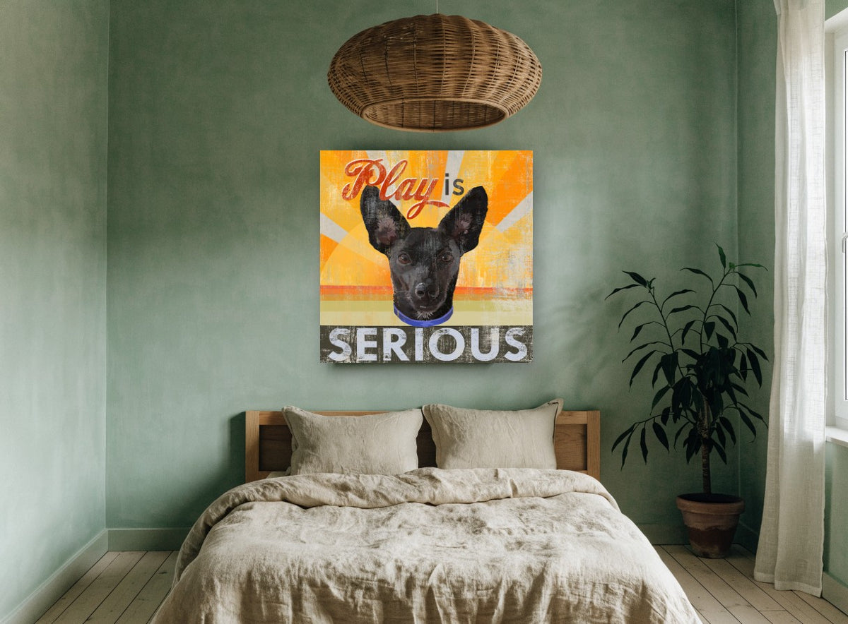 Play Is Serious Pup animal canvas print on the wall of a bedroom