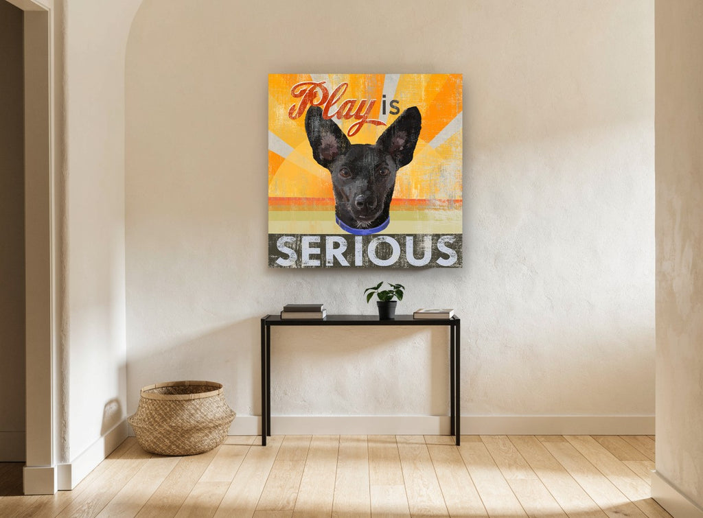 Play Is Serious Pup animal canvas print on the wall of a hallway