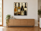 Four European Wine Bottles vintage canvas print on the wall of a living room above a sideboard