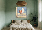 Floating Chambered Nautilus coastal canvas print on the wall of a bedroom