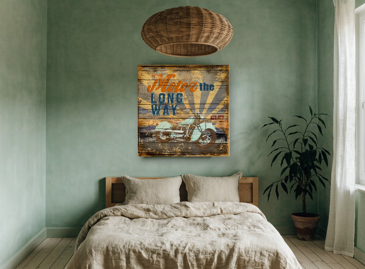 Motor the Long Way vintage canvas print on the wall of a bedroom