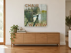 Lakeside Chair Sign landscape canvas print on the wall of a living room above a sideboard