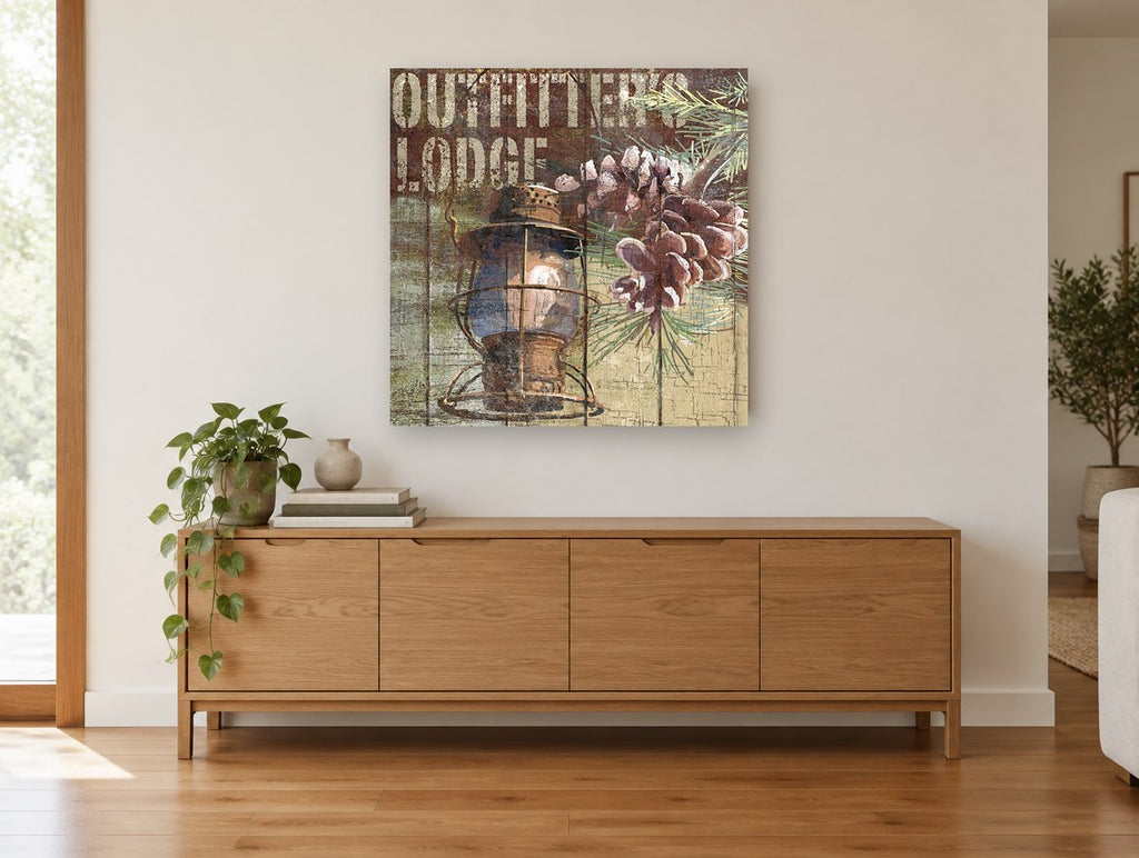 Lantern and Pine Lodge Sign landscape canvas print on the wall of a living room above a sideboard