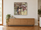 Lantern and Pine Lodge Sign landscape canvas print on the wall of a living room above a sideboard