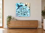 Faith Has Wings animal canvas print on the wall of a living room above a sideboard