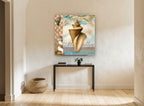 Conch and Lighthouse Collage coastal canvas print on the wall of a hallway