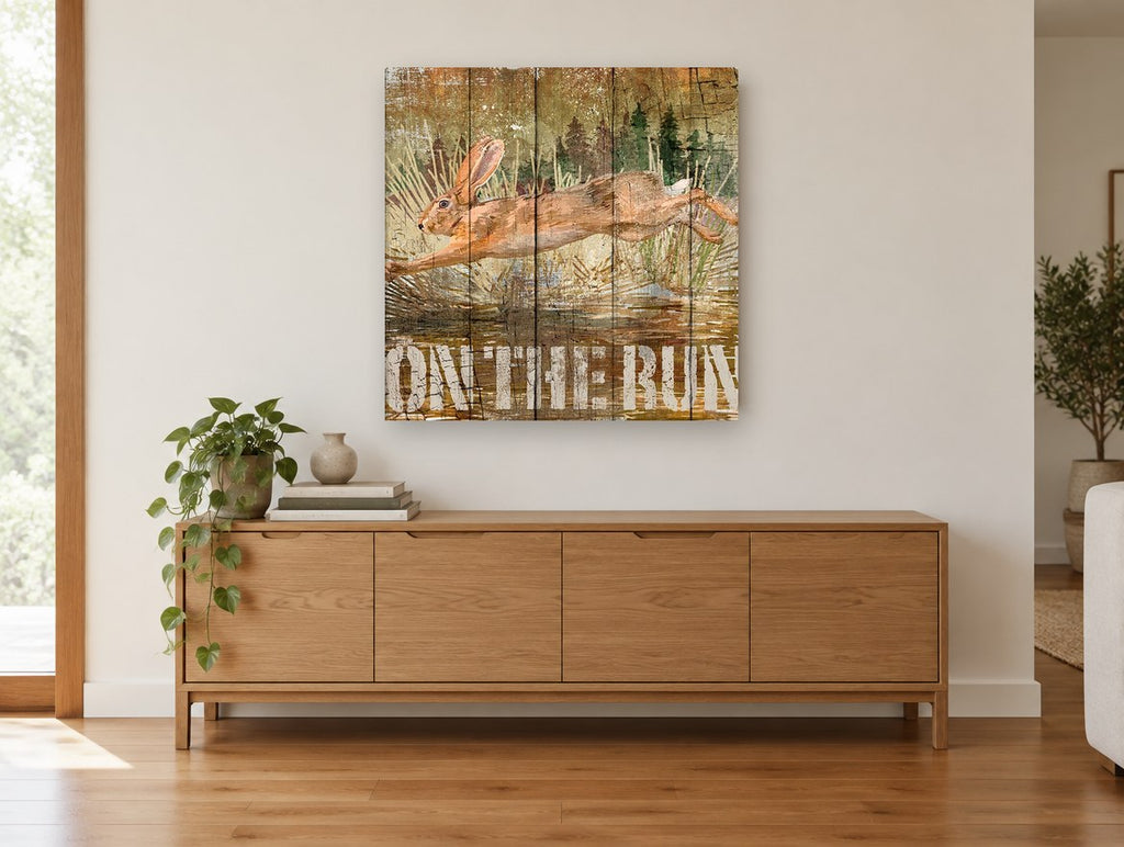 Hare On The Run vintage canvas print on the wall of a living room above a sideboard