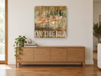 Hare On The Run vintage canvas print on the wall of a living room above a sideboard