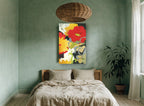 Scarlet and Marigold Bloom floral canvas print on the wall of a bedroom