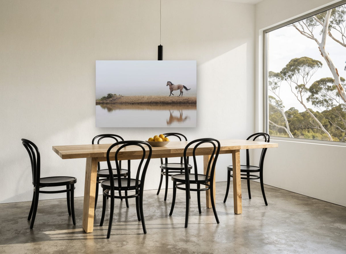 Horse in the Fog landscape canvas print on the wall of a dining room