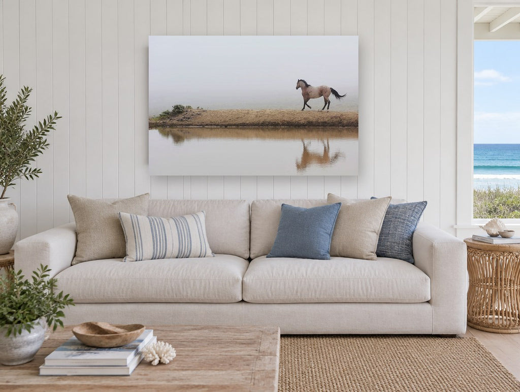 Horse in the Fog landscape canvas print on the wall of a beach house living room