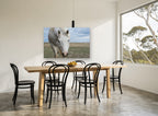 White Horse Plains landscape canvas print on the wall of a dining room