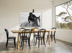 Carried By Grace animal canvas print on the wall of a dining room