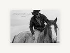 Carried By Grace, cowboy and horse black and white photograph, animal canvas wall art print, front view
