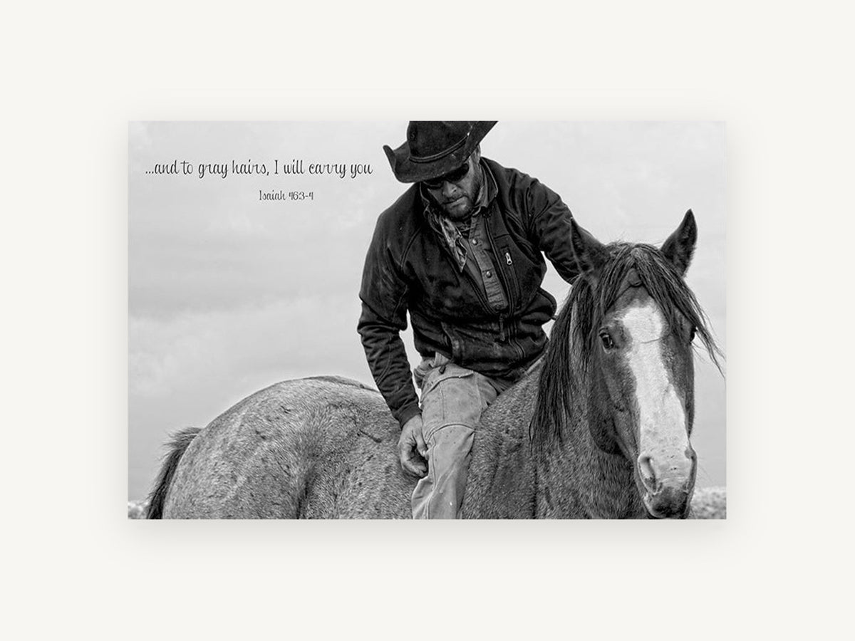 Carried By Grace, cowboy and horse black and white photograph, animal canvas wall art print, front view