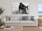 Carried By Grace animal canvas print on the wall of a beach house living room