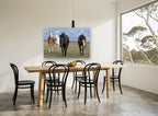 Four Across the Plain landscape canvas print on the wall of a dining room