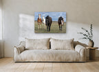 Four Across the Plain landscape canvas print on the wall of a living room