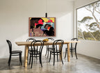 Gold Coast Awaits vintage canvas print on the wall of a dining room