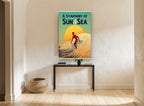 Surfer Against Setting Sun coastal canvas print on the wall of a hallway
