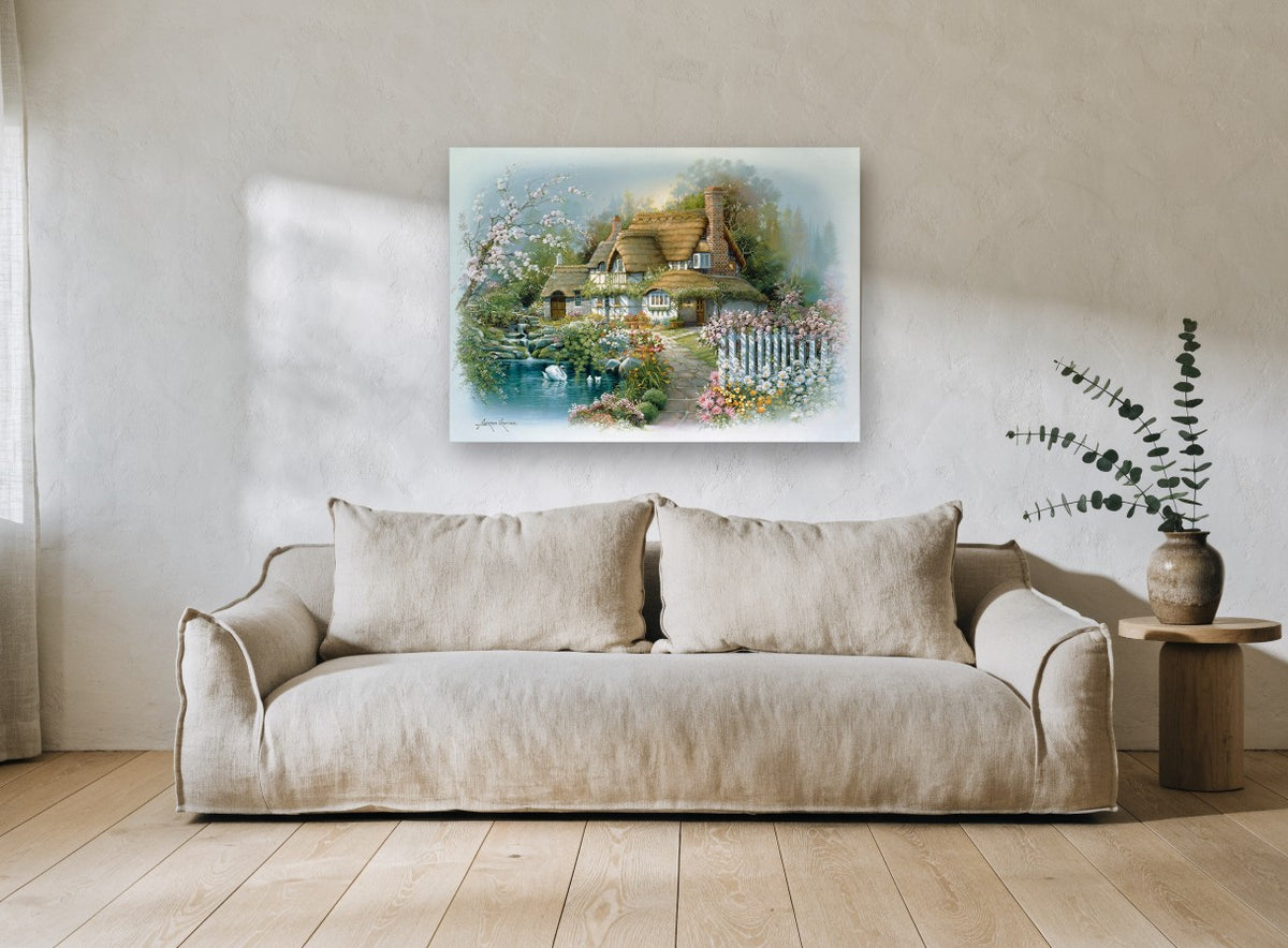Swan Pond Cottage vintage canvas print on the wall of a living room