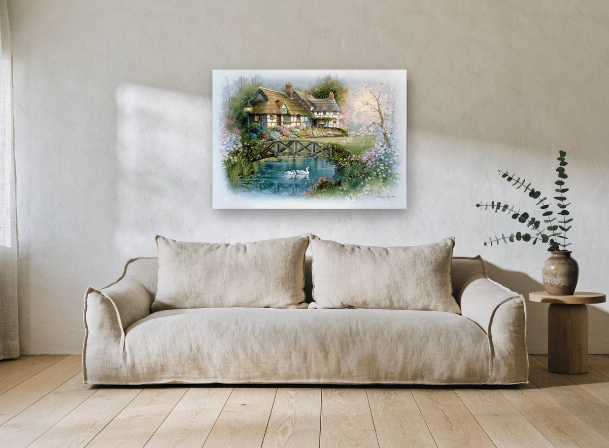 Swan Pond Cottage vintage canvas print on the wall of a living room