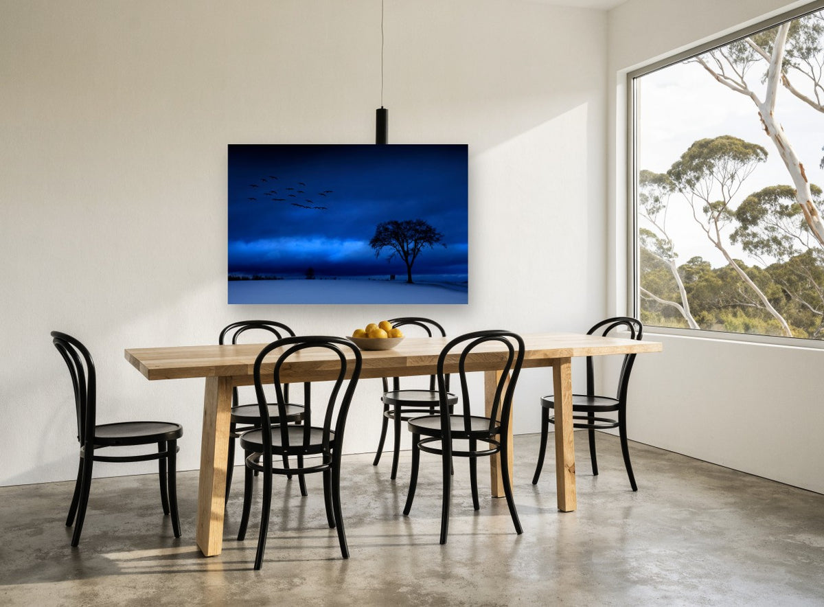 Blue Hour Geese landscape canvas print on the wall of a dining room
