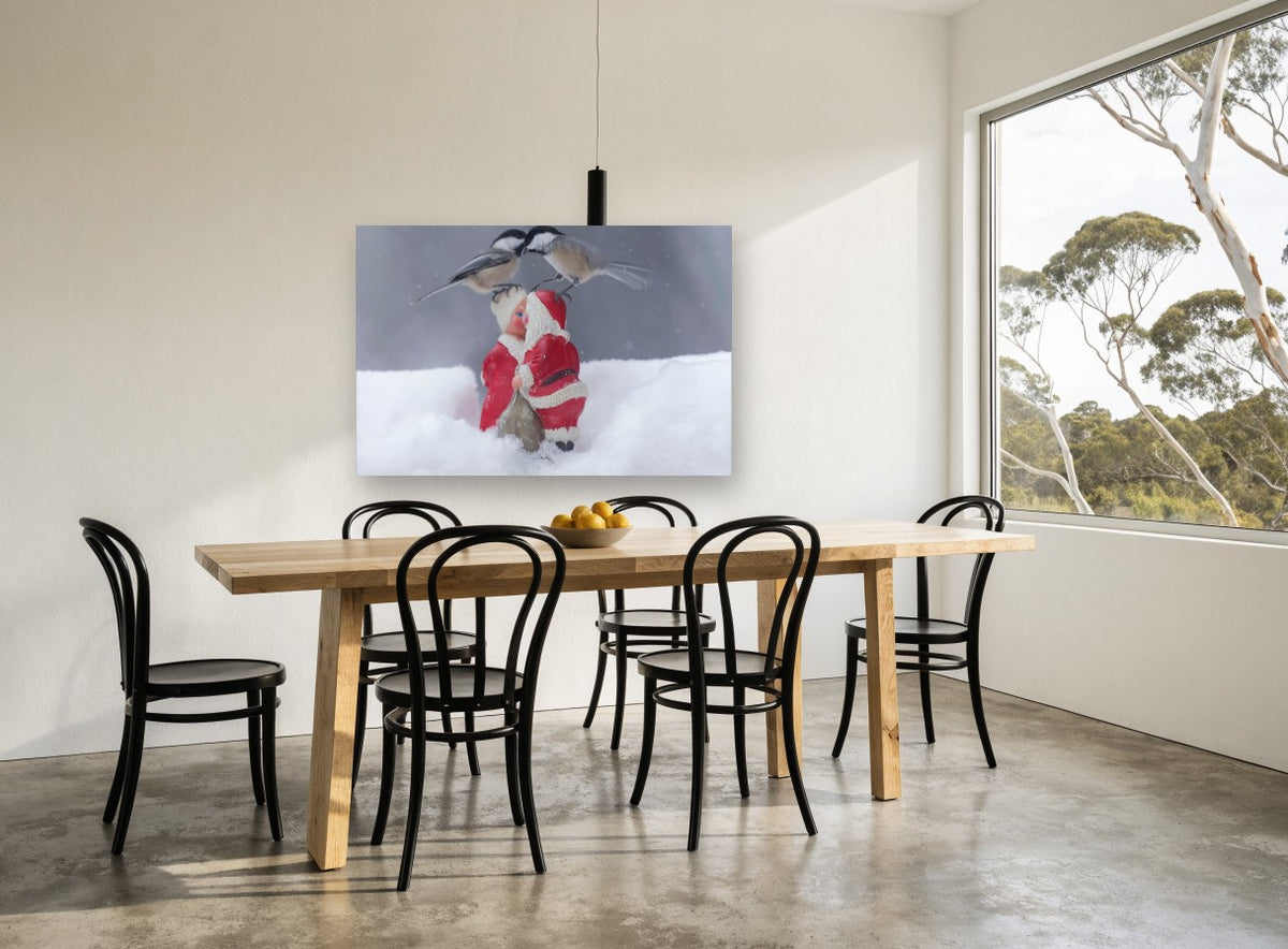 Chickadees Meet Santa animal canvas print on the wall of a dining room