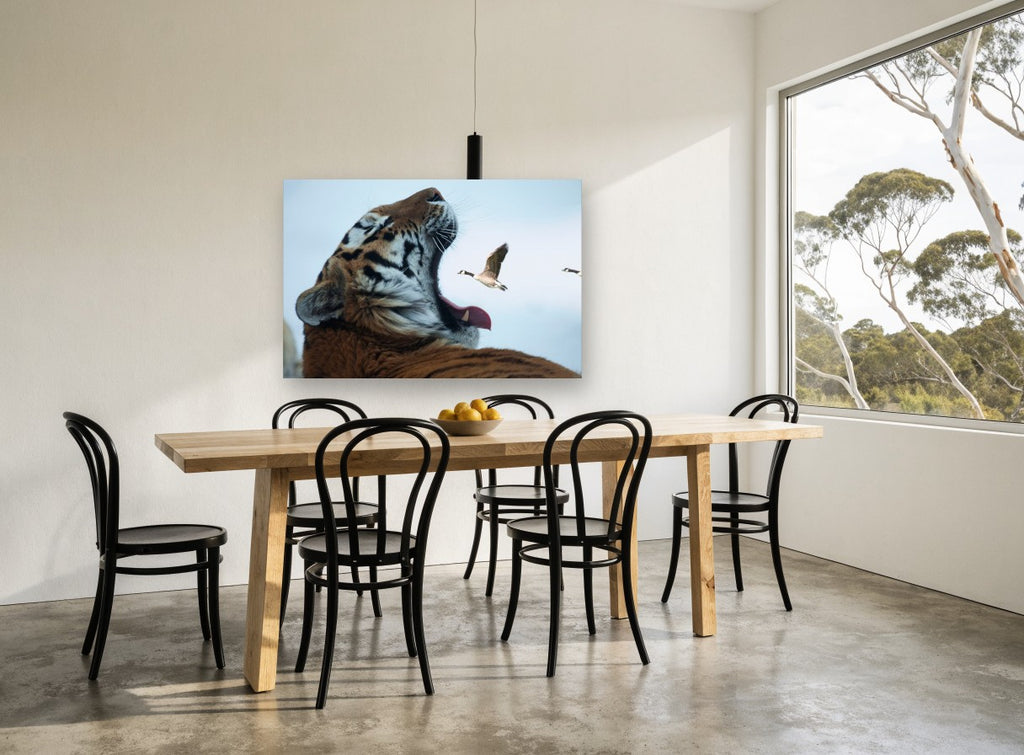 Tiger and Goose animal canvas print on the wall of a dining room