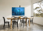 Blue Glow Ice Woods landscape canvas print on the wall of a dining room
