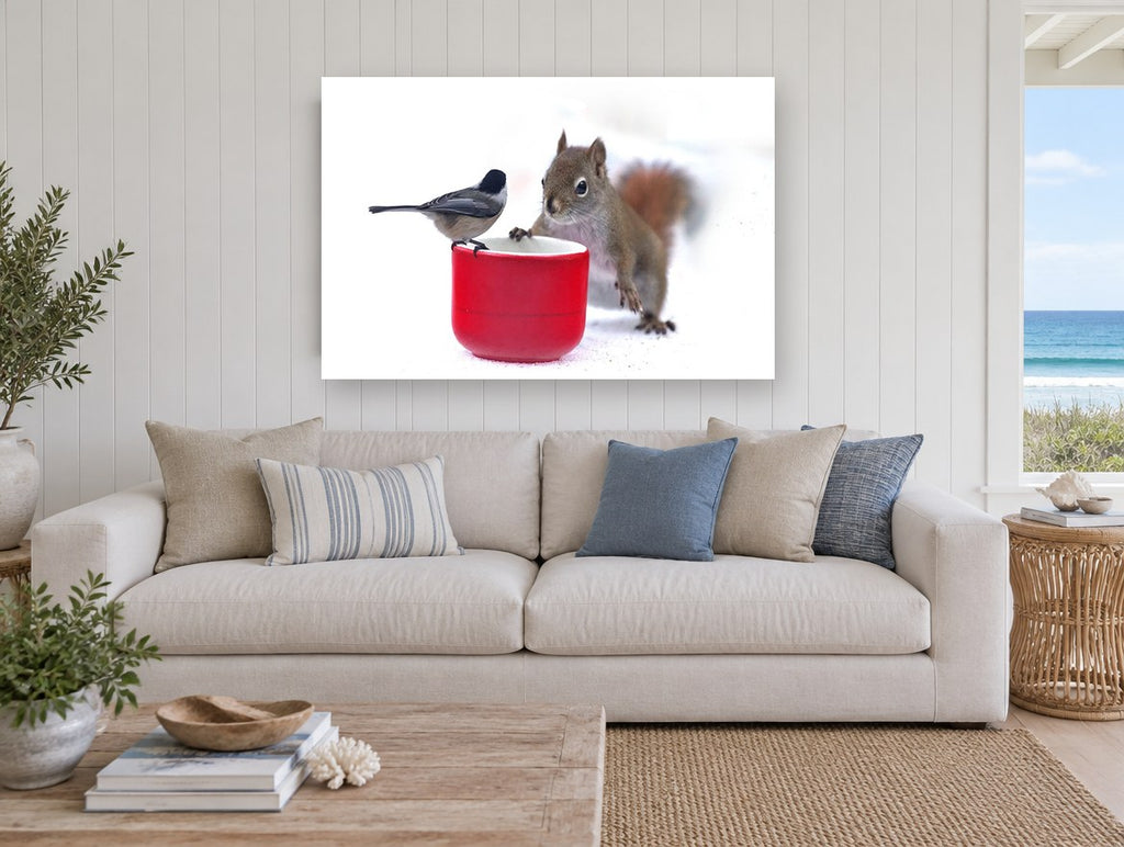 Chickadee and Squirrel animal canvas print on the wall of a beach house living room