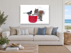 Chickadee and Squirrel animal canvas print on the wall of a beach house living room