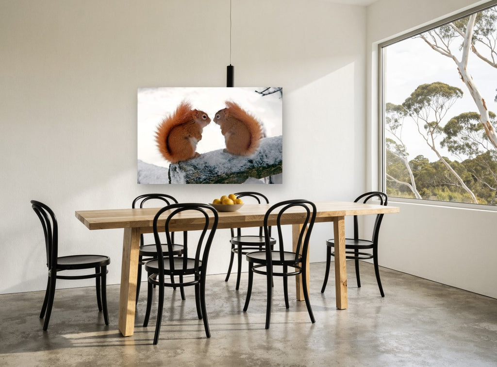 Winter Squirrel Pair landscape canvas print on the wall of a dining room